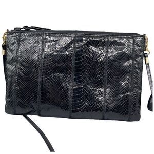 Vintage Four Seasons reptile skin cross body bag.